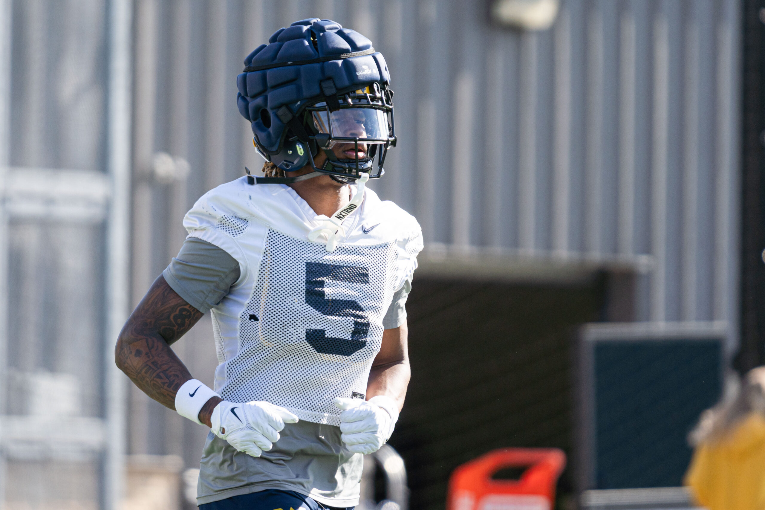 WVU receivers coach Ryan Garrett still searching for starters on the outside, slot
